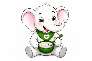 TuTu the elephant enjoying a bowl of porridge